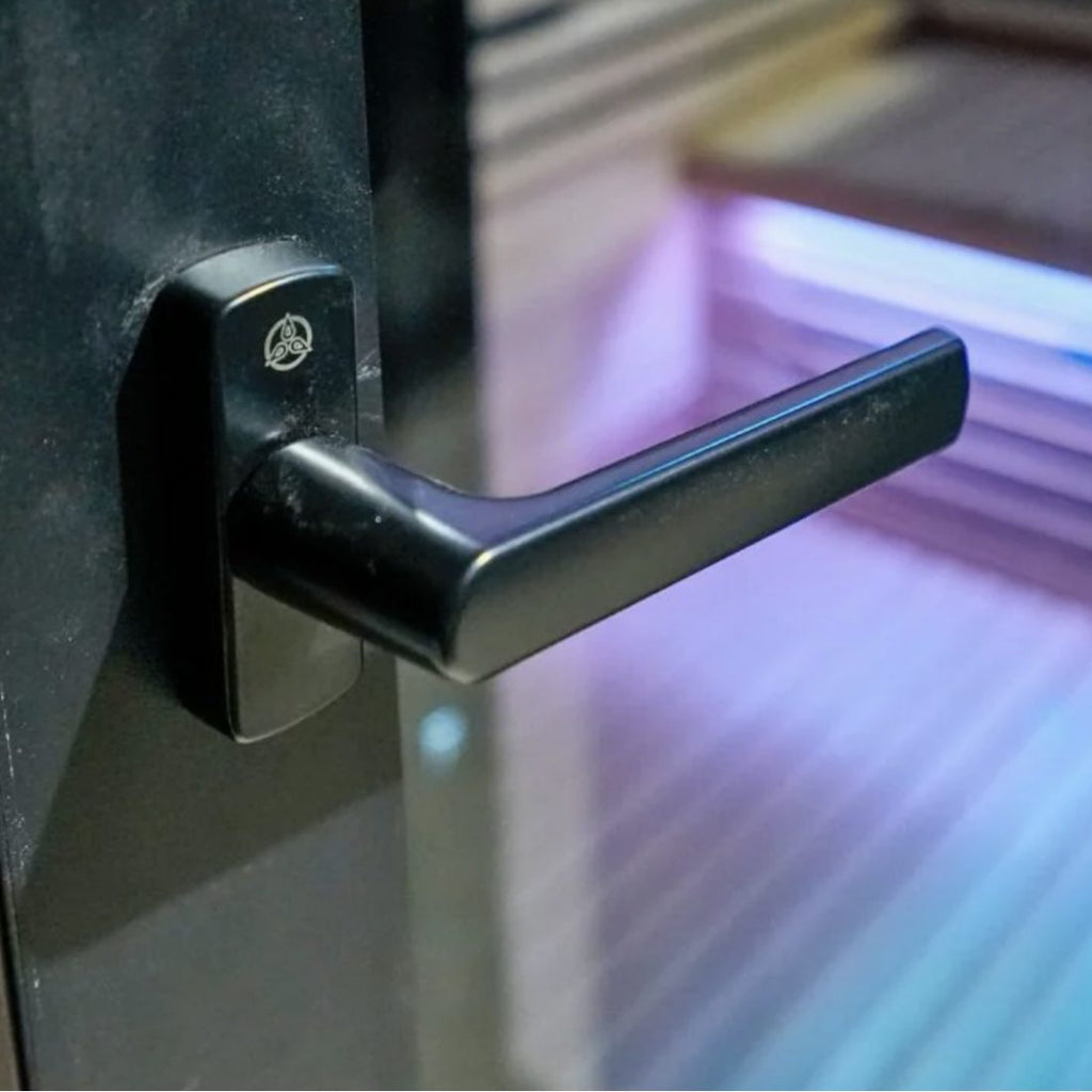 Heavy-duty aluminium door frame with solid metal handle on the Bella Deluxe 3 sauna